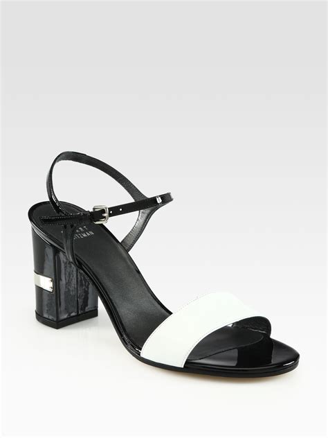 Stuart Weitzman Solo Bicolor Patent Leather Sandals In White Black