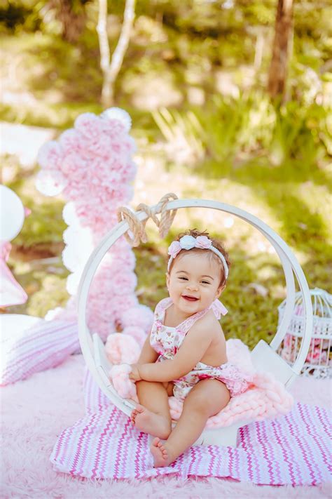 Photo of a Smiling Baby in a Pink Outfit · Free Stock Photo