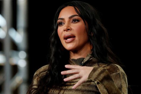 Kim Kardashian Stuns In Racy Red Lingerie Dress During Italy Vacation
