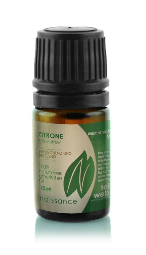 three bottles of essential oils sitting next to each other