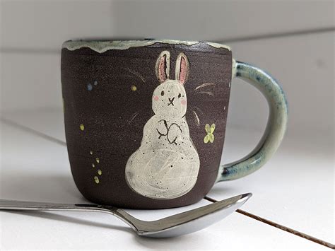 Mug Black Stoneware Bunnies Kness