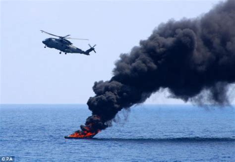 Somali Pirate Boat Blown Up By Chopper As Navy Frigate Crew Arrest 12