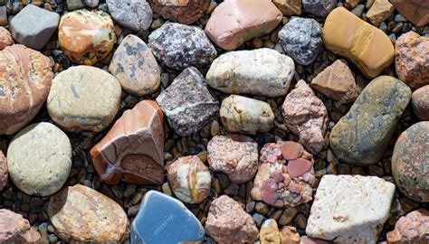 Premium Photo | Background of colorful stones of different shapes