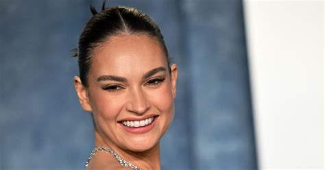 Lily James Puts Bikini Body On Display During Boat Day Photo