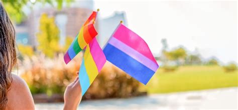 Premium Photo Gender Queer People Wave LGBTQ Gay Pride Rainbow Flags