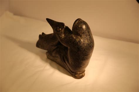 Inuk Holding Large Fish Inuit Carving Langford Gallery