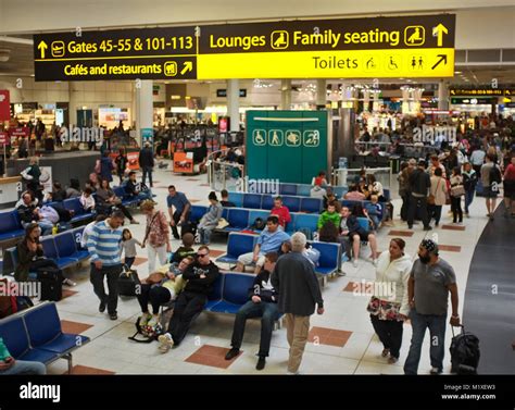 Busy Departure Lounge With Travellers At Gatwick Airport Stock Photo