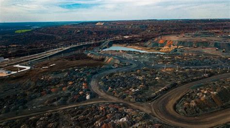 Aerial View Of The Iron Ore Mining Panorama Of An Open Cast Mine