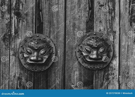 Grayscale Shot Of A Old Wooden Door With Mythological Chinese Dragon