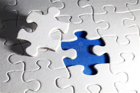 Plain White Jigsaw Puzzle On Blue Background Stock Image Image Of