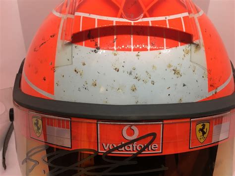 Collector Studio - Fine Automotive Memorabilia - 2005 Michael Schumacher Ferrari helmet - USGP win