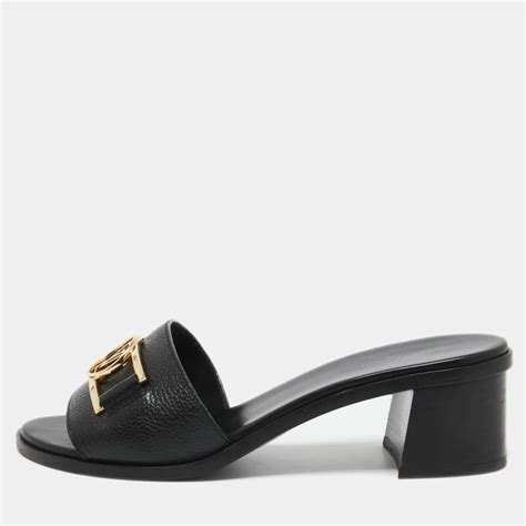 Louis Vuitton Black Leather Lock It Slide Sandals Size 38.5 Louis Vuitton | The Luxury Closet