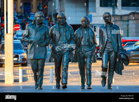 Liverpool UK May 17 2018 Bronze Statue Of The Beatles Stands At The