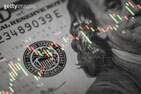 Closeup Benjamin Franklin Face On Usd Banknote With Stock Market Chart