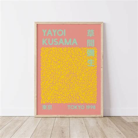 A Pink And Yellow Poster With The Words Yayoi Kusama On It