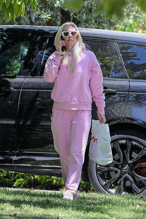 ERIKA JAYNE in a Stylish Tracksuit and Pink Adidas Sneakers Out in Los Angeles 07/19/2023 ...