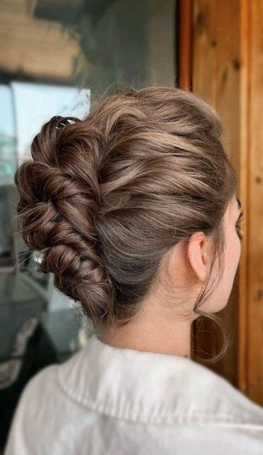 Chic Updos To Elevate Your Hair Game Brunette French Twist With A Twist