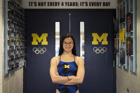 UMich swimmer Maggie MacNeil wins Olympic gold medal