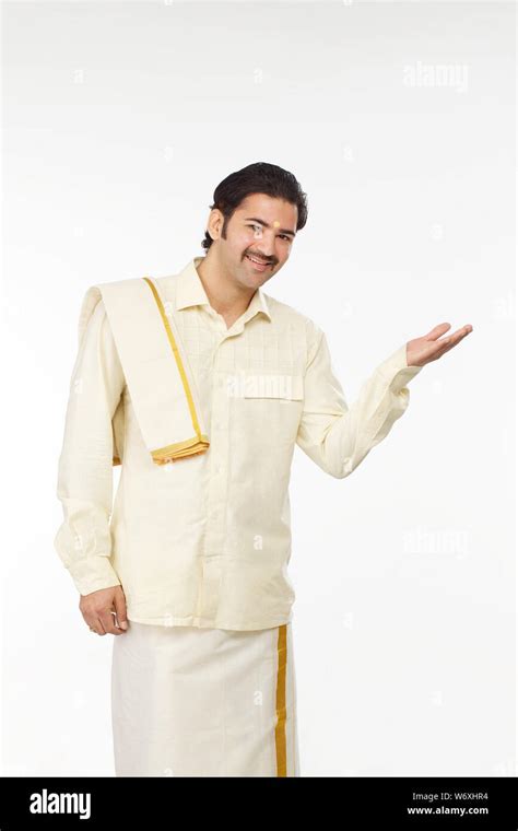 South Indian Man Smiling And Gesturing Stock Photo Alamy