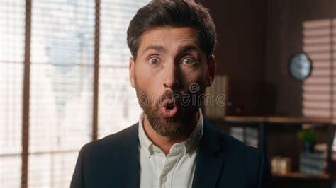Close Up Face Shocked Amazed Stunned Mature Business Man Looking At Camera With Big Eyes Open