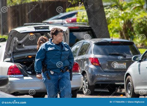 A Black Female Detective From Lapd`s Metro Division Walks By Police