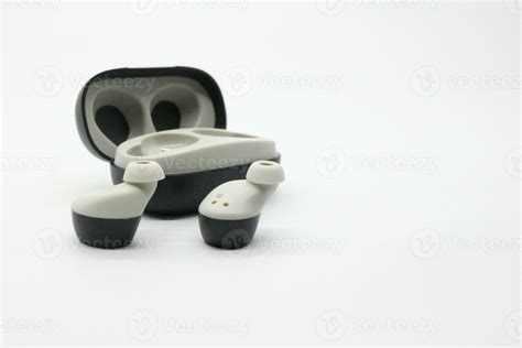 Black bluetooth earphones 27791269 Stock Photo at Vecteezy