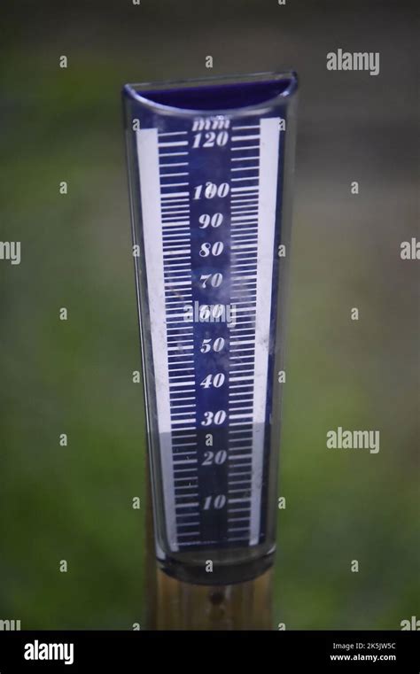 Device To Measure The Amount Of Rainfall On The Ground Stock Photo Alamy