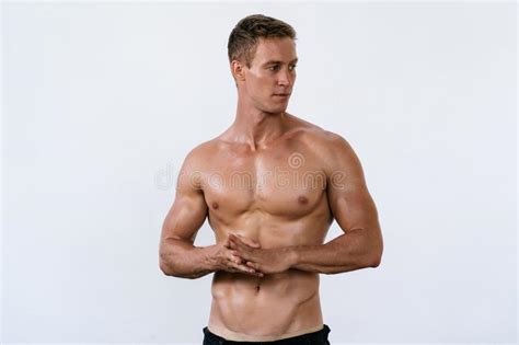 Athletic Man With Naked Torso On White Background Fashion Portrait Of Sporty Healthy Guy Stock