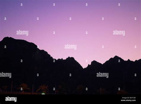 Sunset skyline Ar Rawdah near Muscat Oman Stock Photo - Alamy