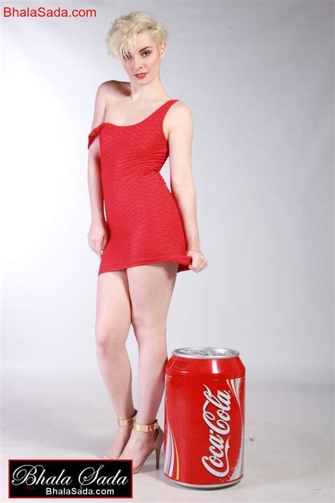Smoking Hot Blonde Girl Loves Posing With A Big Coke Can Photos
