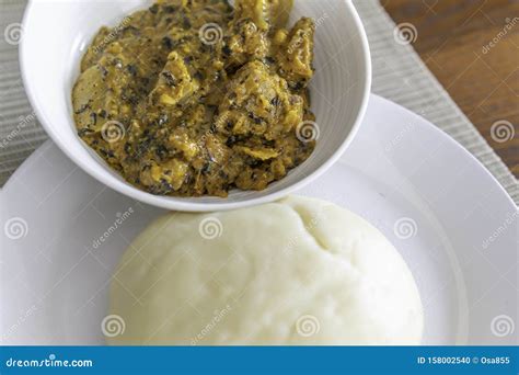 Nigerian Pounded Yam Served with Spicy Bitterleaf Soup Stock Photo - Image of plate, meat: 158002540