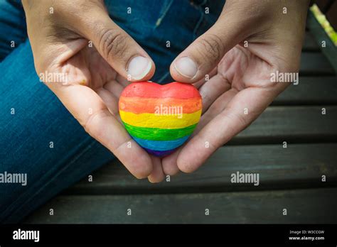 Heart With Rainbow Stripes In Female Hands LGBT Pride Flag Symbol Of Lesbian Gay Bisexual