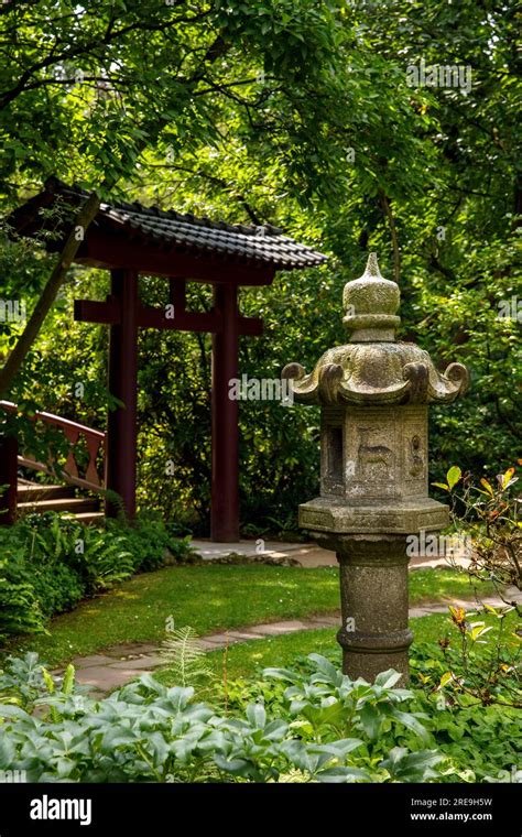 Torii Gate And Stone Lantern At The Japanese Garden In Leverkusen