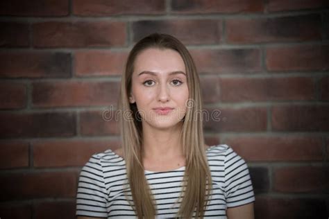 Portrait Of A Blonde Hair Blue Eyes Girl Teenager At Home Stock Photo