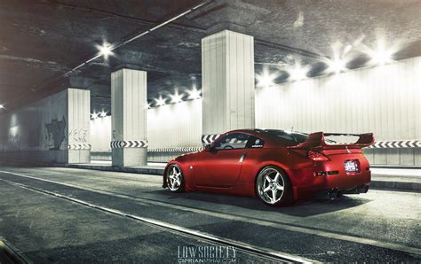 Modified Red Nissan 350Z Driving Low — CARiD.com Gallery