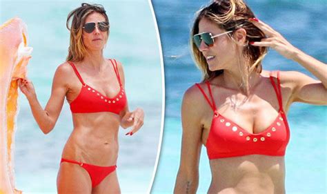 Heidi Klum Looks Red Hot As She Puts On Busty Display In Tiny Bikini