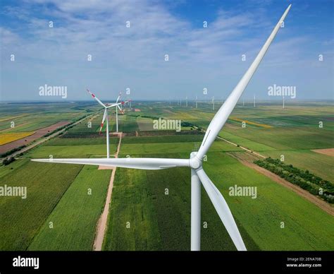 Aerial View Of Giant Wind Turbine Rotating In Strong Winds Wind