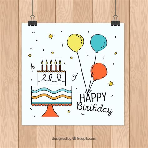 Tarjeta de cumpleaños con tarta en estilo hecho a mano Vector Gratis