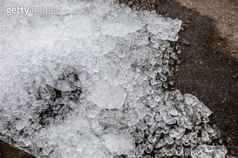 Pile Of Ice In The Street Either From A Freak Hail Storm Or The