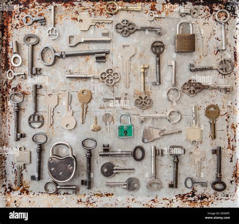 Various Keys On Rusty Background Stock Photo Alamy