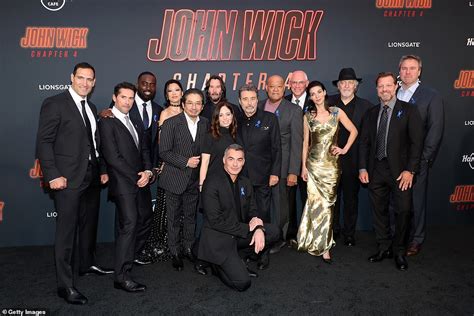 Keanu Reeves Looks Dapper In A Black Suit As He Leads Stars At The John