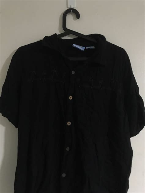 Black Polo Shirt, Women's Fashion, Tops, Shirts on Carousell