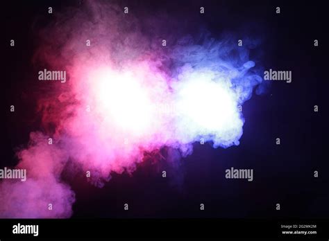 Smoke In Blue Light On Black Background Stock Photo Alamy