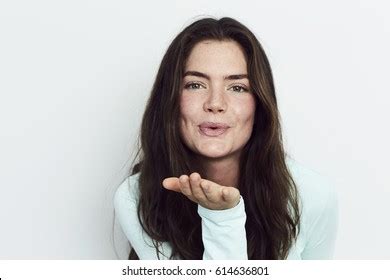 Brunette Beautiful Woman Blowing Kiss Camera Stock Photo 614636801 Shutterstock