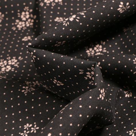 Tissu Viscose Arty Gabrielle Sur Fond Noir Par Cm