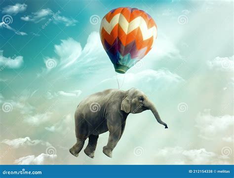 Huge Elephant Floating Or Flying With Air Balloon With Sky And Clouds