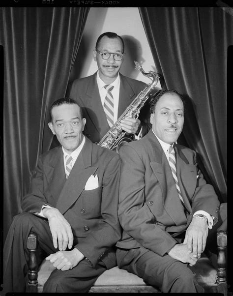 Drummer William Burford On Left Claude Fisher Holding Saxophone And