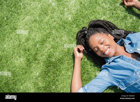 Woman Laying In Grass Hi Res Stock Photography And Images Alamy