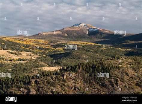 Early Fall snow with autumn colors on Del Norte Peak in the Rio Grande ...