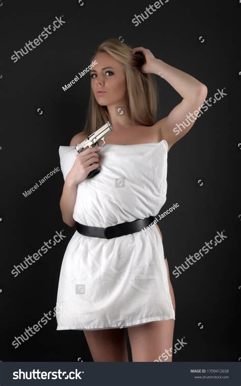 Sexy Blonde Woman Gun Stock Photo 1709412658 Shutterstock